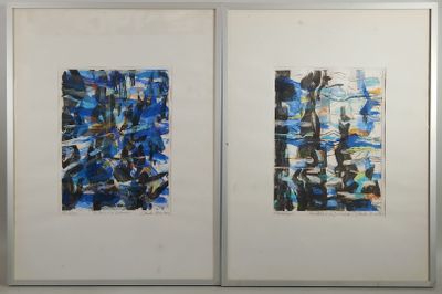two framed paintings of blue and black abstract shapes on a white wall