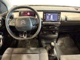 a picture of a car dashboard with a steering wheel