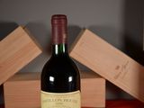 a bottle of wine that is sitting on a table