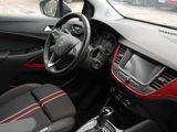 the interior of a car with a steering wheel and a dash board