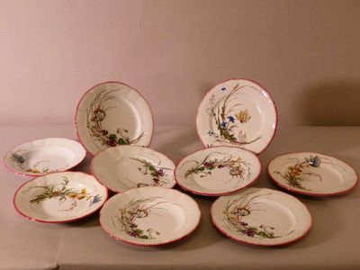many plates that are sitting on a table