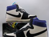 a pair of black and white sneakers with blue accents