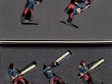 six figurines représentant un homme sur un snowboard, dans une boîte