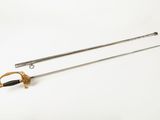 a close up of a sword on a white surface with a white background