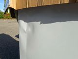 a box that is sitting on the side of a building