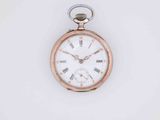 an antique pocket watch with a white dial and roman numerals on the face