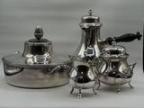 silver plated tea and coffee set on a white background