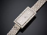 an art deco diamond watch, by cartier