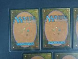 three decks of magic the gathering are shown on a table