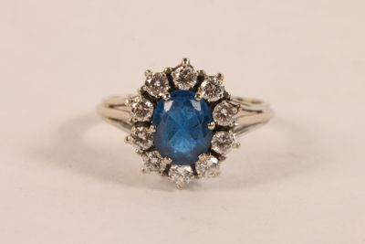 Bague marguerite en or gris 750 ‰ sertie d'un spinelle bleu … - Photo 1