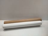 a roll of brown and white paper sitting on top of a table