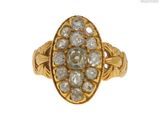 une image représentant une bague en or sertie d'un bouquet de diamants