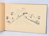 a book with a drawing of a group of people riding on a train