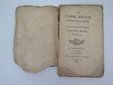 an old book opened to show the title of a poem
