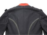the back view of a black jacket with a red collar