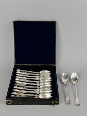 silverware in a black case with six spoons and two spoons