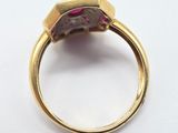 an image of a gold ring with a pink tourmaline stone
