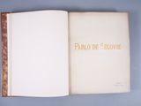an open book on a blue surface with the title pablo de secovie
