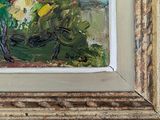 a picture of a painting in a frame on the wall