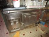 an image of a kitchen with a lot of clutter on the floor