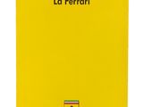 un cahier jaune sur lequel est inscrit « la ferrari »