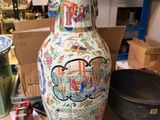a vase that is sitting on a shelf in a shop