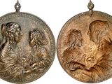 two silver medallions depicting the virgin and child of jesus