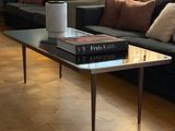 a living room with a couch and a coffee table