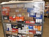 a metal cart with many boxes on it in a warehouse
