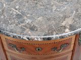 an image of a marble top table with a drawer underneath it