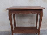 an image of a wooden table with a shelf on it