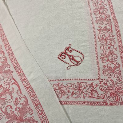 an image of a red and white table cloth with a heart on it