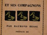 an old book with a picture of two birds on it