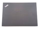 the back of a laptop with a sticker on the side of it