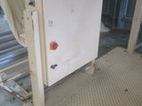 a picture of a white refrigerator sitting on a floor in a room