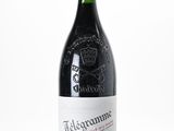 a bottle of wine that is sitting on a table