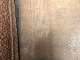 a close up of a person ' s foot with a brown shoe