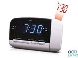 an alarm clock that is displaying the time on the clock