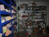 a room filled with lots of boxes and shelves