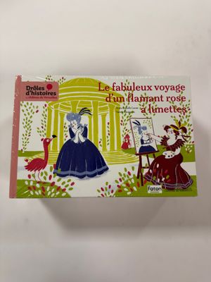 a book with a picture of a woman in a blue dress