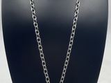 silver plated heart pendant on a silver chain necklace on a black mannequin