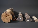 five pieces of wood sitting next to each other on a table