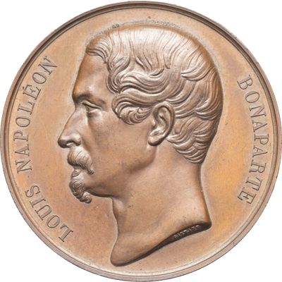 une image représentant une médaille de bronze sur laquelle figure le profil d'un homme