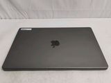 an apple macbook pro laptop is sitting on a white surface