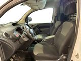 the interior of a car with a steering wheel and a dashboard