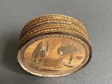 an image of a wooden box with a picture of two bears on it