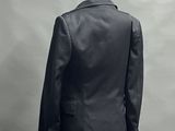 an image of a mannequin wearing a suit and tie