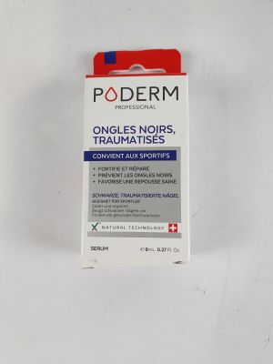 l'emballage d'un tube de dentifrice posé sur une surface blanche