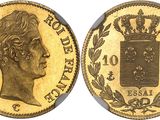une pièce souveraine en or surmontée d'une couronne