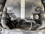 a picture of a car engine with its hood open